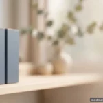 Orderly row of blank file folders on a light shelf, shallow depth of field, no legible text
